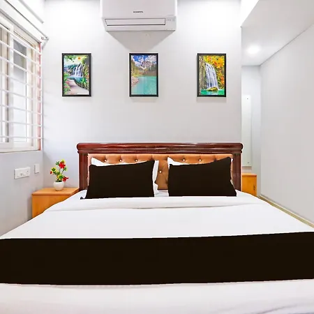 Super Townhouse Qualia Elite S R Nagar Hotel